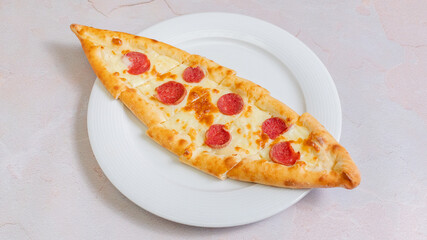 Turkish sausage pide top view isolated