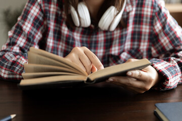 Asian woman student study online with skype teacher, happy young woman learn language listen...