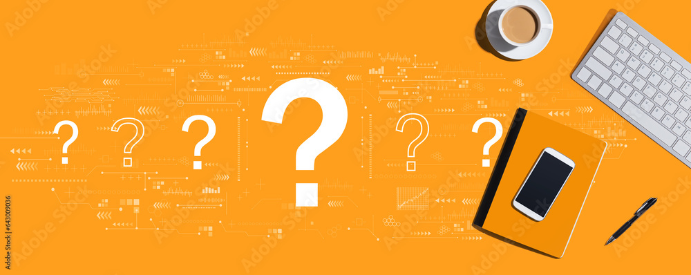 Aufkleber question marks with a computer keyboard and office items