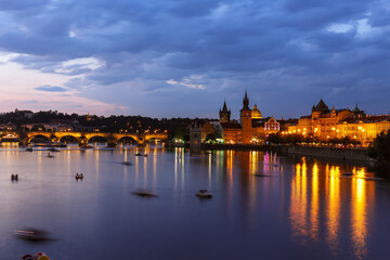 Fototapeta na wymiar Prague medieval architecture and Charles bridge over Vltava river at night, Czech Republic