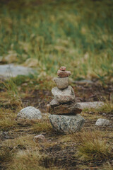 A Zen-style stone pyramid in a natural setting 