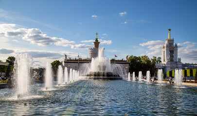 Fountain pavilions at the exhibition in a contoured light on a clear sunny day, Moscow. Sights of Russia World tourism.