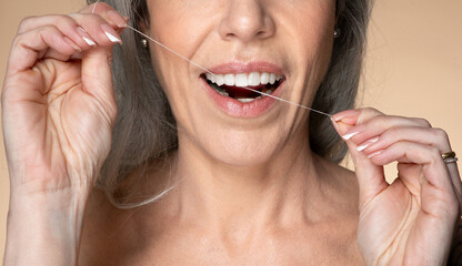 Perfect smile, toothcare and oral treatment concept. Closeup shot of unrecognizable senior woman...