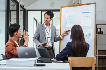 Opinion insights sharing organization meeting of Asian business people in meeting room, Constructive Feedback, Group Decision-Making, Strategic Planning, Diverse Perspectives, Contributing Ideas