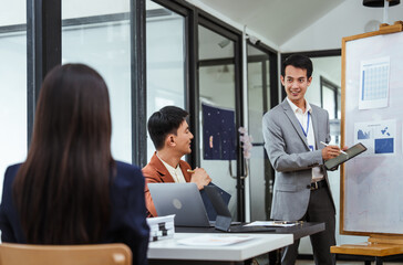 Opinion insights sharing organization meeting of Asian business people in meeting room, Constructive Feedback, Group Decision-Making, Strategic Planning, Diverse Perspectives, Contributing Ideas