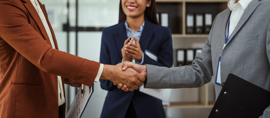 Shaking hands, Opinion insights sharing organization meeting of Asian business people in meeting...