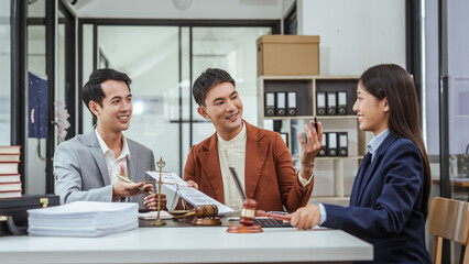 Legal consultation, asian lawyers team meeting post-contract, contract finalization, lawyers discussing agreements, contract review session, agreement assessment, legal experts in conversation