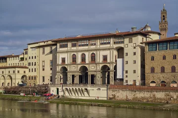 Selbstklebende Fototapeten Morning view of river Arno and the palace seat of the rowing society of Florence,  Italy  © Paolo