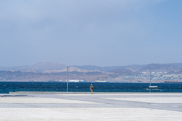 Obraz premium Loneliness tourist woman walking in the fort of Aqaba