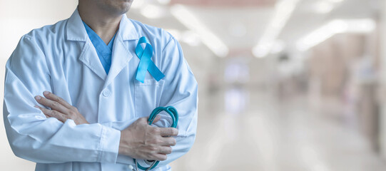 Blue ribbon for prostate cancer awareness, men's health care,  guillain-barre syndrome GBS concept with symbolic bow on doctor lab coat