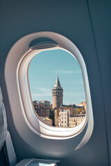 Aerial panorama of the city of Istanbul with Galata Tower, which opens from the window of the plane...