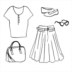 A set of women's elegant clothes. Vector doodles. Isolated objects on a white background.