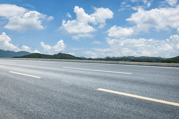 Empty asphalt road and mountain nature scenery in Guilin, China