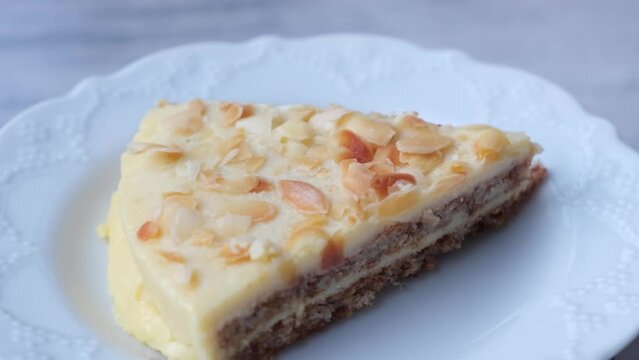 Almond white chocolate cake in 360 degree rotating showcase