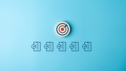Target objective with work checklist for business objective target goal concept. Aiming dart board...