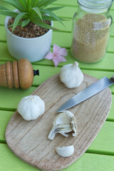 Garlic bulbs on cutting board