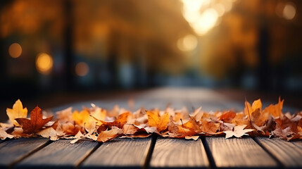 Naklejka na ściany i meble Beautiful colorful natural autumn background for presentation. Wooden boards on the background of a blurred autumn park.