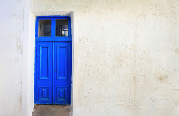 Old wooden door in a Greek village