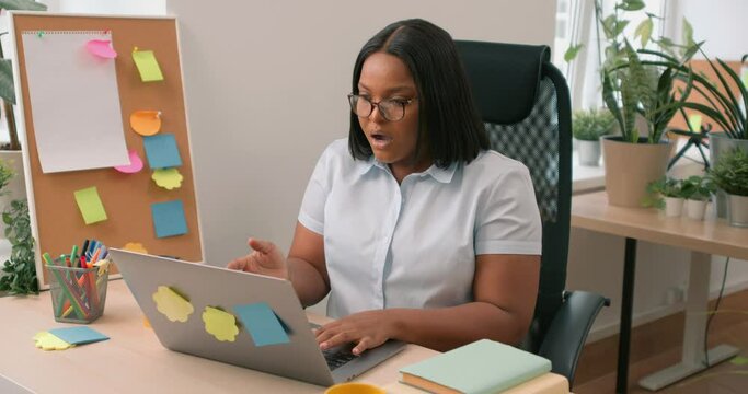 Shocked Young Businesswoman Wondering, Black girl with widely opened mouth showing shocked astonished wow facial expression. Sale, discount concept, woman is afraid and excited with fear expression