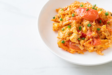 Stir-fried tomatoes with egg or Scrambled eggs with tomatoes