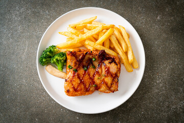 grilled chicken steak with potato chips or french fries
