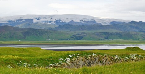 The longest Myrdalsjokull Glacier viewed from Dyrholaey in Iceland