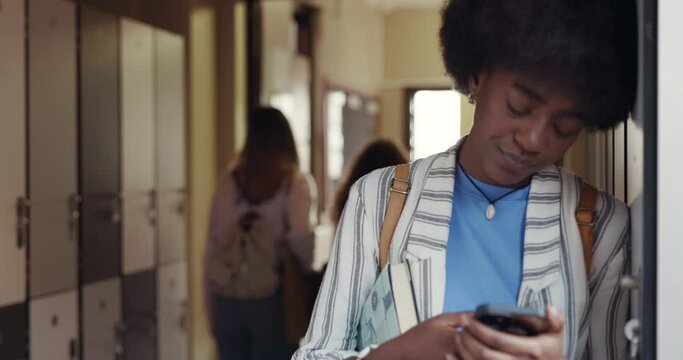 Phone, bullying and sad with black woman in college for social media, anxiety and contact. Gossip, outcast and low self esteem with university student at school for rumor, mental health and thinking