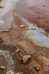 Texture of stagnant salt marshes in ocher tones.
