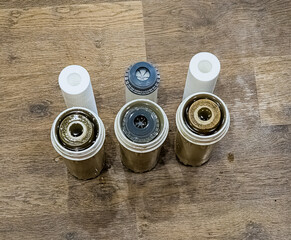 Used water filters with traces of dirt, clay and impurities and clean filters, prepared for...