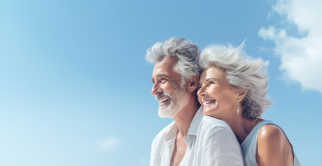 Happy smiling mature senior couple on the beach