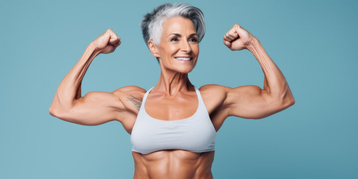 A portrait of an middle aged beautiful woman who promotes a healthy lifestyle and a good line and muscles even at age