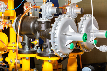A fragment of a gas control station with gas pressure stabilizers.