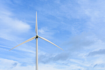 Windmill against blue sky