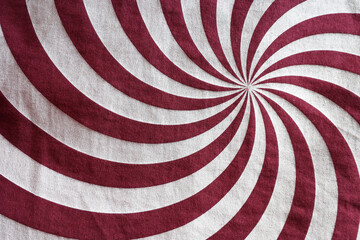 A swirl pattern fabric in red and grey