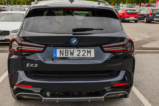 Beautiful back view of 2023 BMW iX3 M Sport - Electric SUV black car. Sweden. 