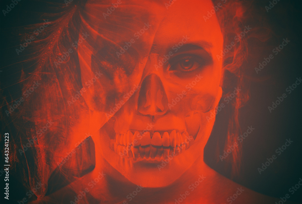 Canvas Prints screaming frightened girl with a mask of a human skull on her face on a black and red background. ha