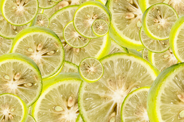 Yellow lime slices macro textured background