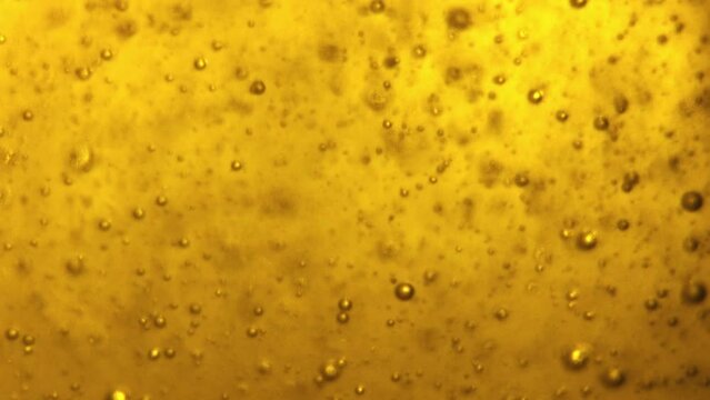bubbles in liquid, carbonated drink, texture with bubbles. cold beer, oil or shampoo, abstract background