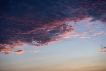 beautiful sunset golden sky, in style of purple, blue and pink clouds background