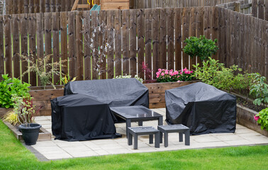 Garden plant display and outdoor furniture during summer
