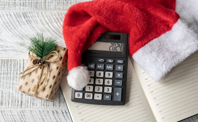 New Year's layout with calculator, Santa's hat and Christmas decorations