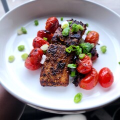 Grilled salmon with Roasted plum tomatoes