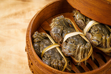 Fresh live crab against a monochromatic background