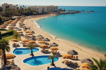 Fototapeta na wymiar Aerial view of luxury swimming pool in luxury hotel resort on the Red Sea coast