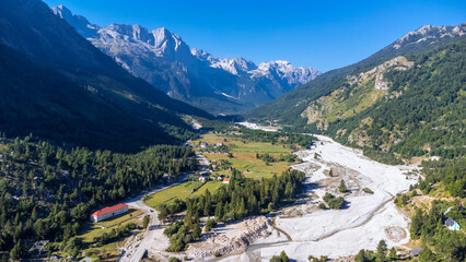 Aerial view of Valbona valley and its pretty lodges, Theth national park, Albanian Alps, Albania. © unai