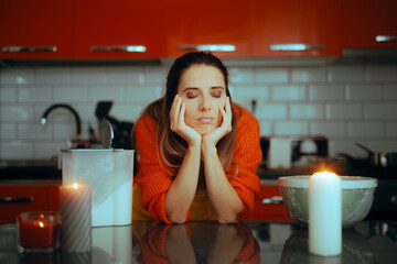 Tired Sad Housewife Waiting for the Dough to Rise. Stressed woman baking some dessert for the holidays late in the evening 

