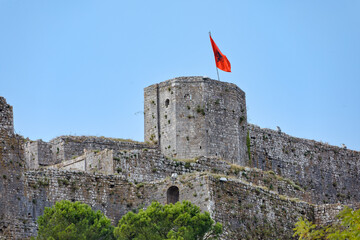 Rosafa Castle Walls with Waving Albanian Flag in Shkoder