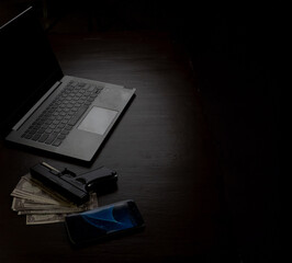 Computers, mobile phone, money, guns, and other devices that hackers use to steal or hijack...