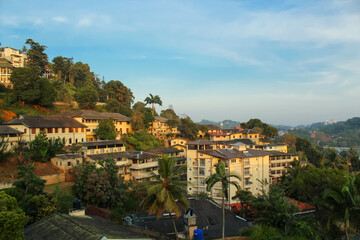 Fototapeta na wymiar View on the houses on the hills in Kandy, Sri Lanka in the early morning