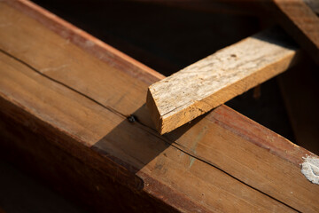 Wooden planks in the boat. Close-up view.